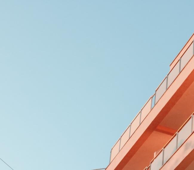 low-angle-shot-of-the-balconies-of-a-modern-buildi